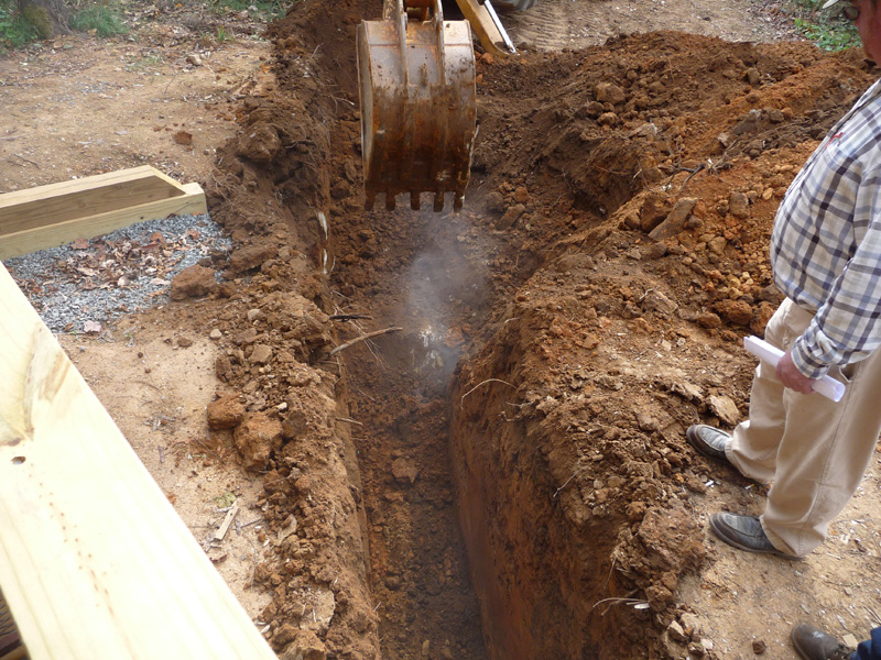 Hitting rock in the trench for geothermal piping