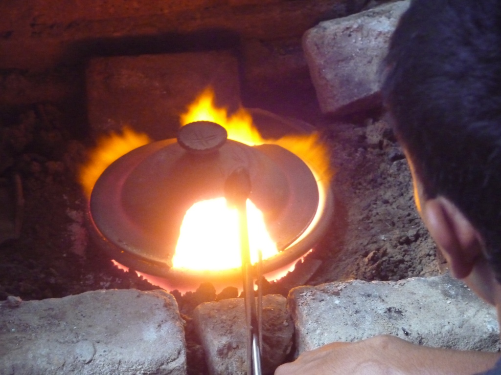 Residue being burned in covered bowl