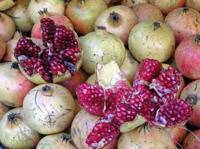 Pomegranetes in an outdoor market